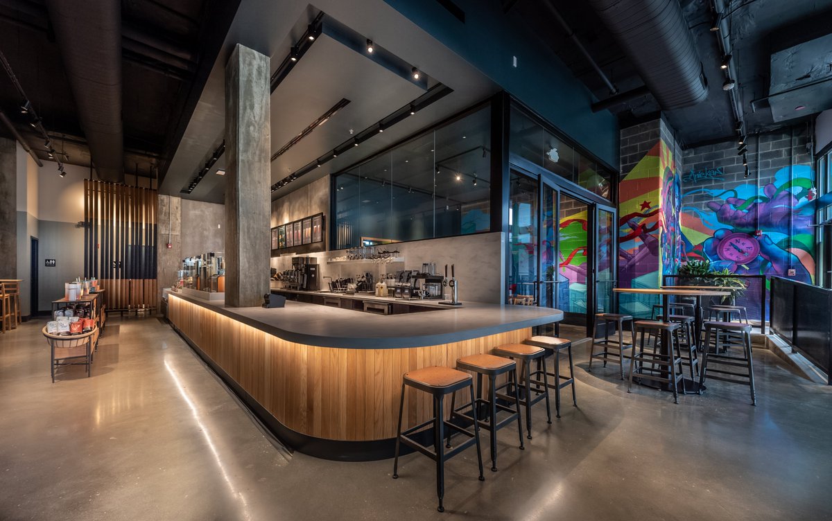 CorenicCG's tweet photo. Starbucks Anacostia was the 16th store of this type in all of the 15,000 North American store portfolio. The custom murals with Chuck Brown and Frederick Douglas were a real cool factor. #starbucks #corenic #retail #anacostia https://t.co/fXEj5zn1wT
