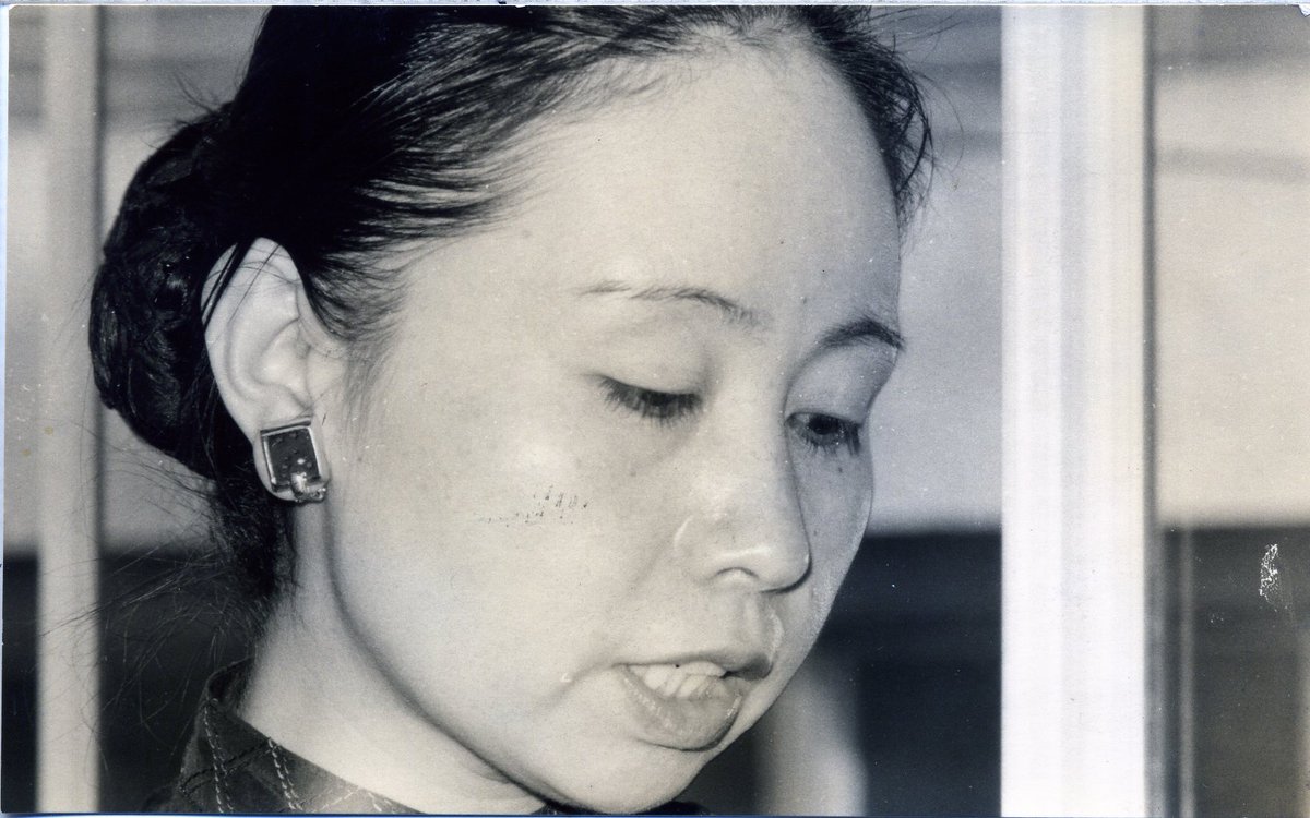 ... many of their comrades’ and mentors’ belongings and other materials. And so that’s how I came to call myself “The Caretaker of the Kondo Library.”[photograph of Chinami Kondo, with her hair pulled back, looking down.]