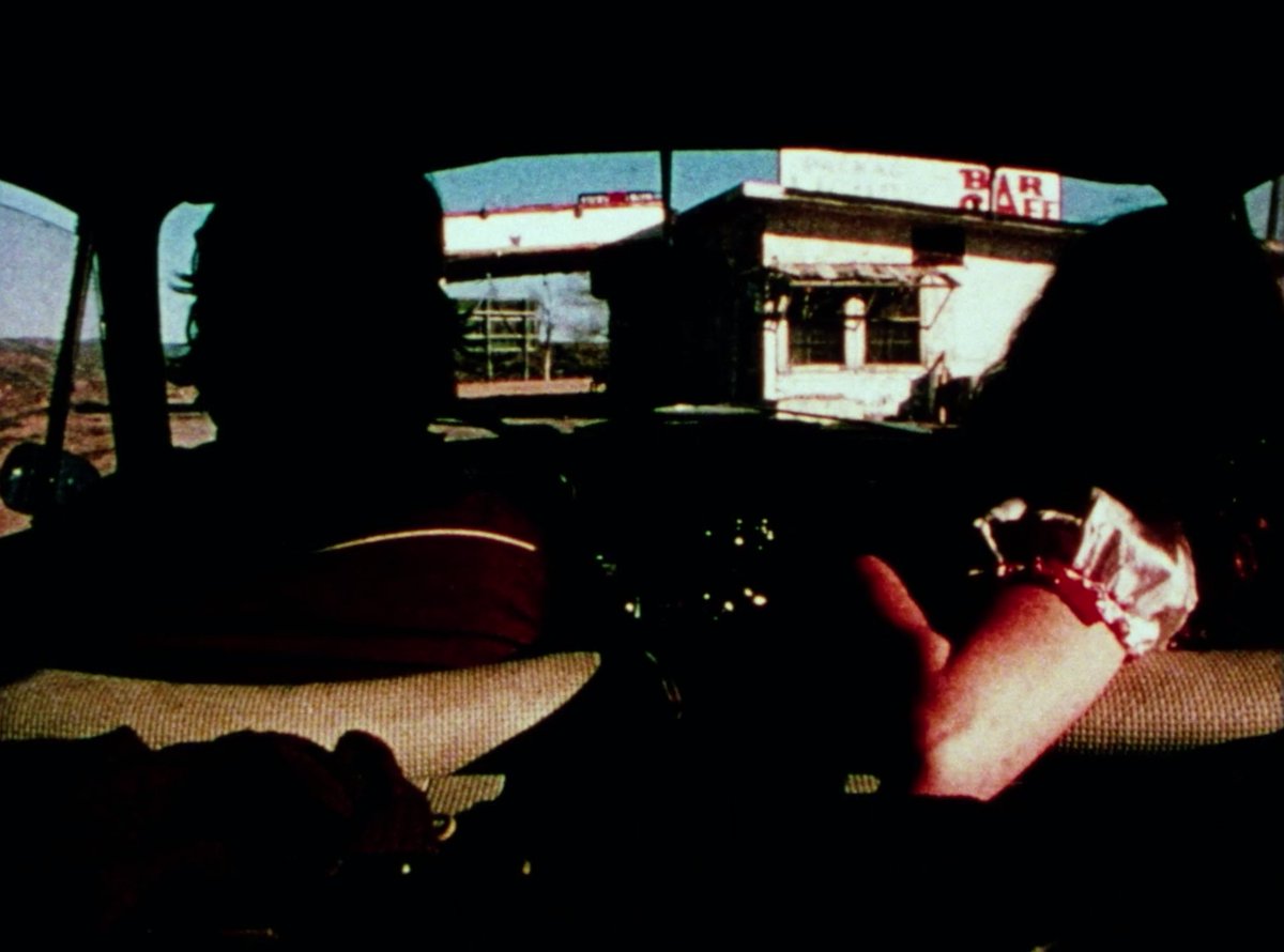 THE UNITED STATES OF AMERICA (1975), one of the major works of the structuralist film movement of the 1970s, is a richly revealing portrait of Vietnam-era America as seen through the windshield of the filmmakers’ car while on a road trip from New York to Los Angeles.