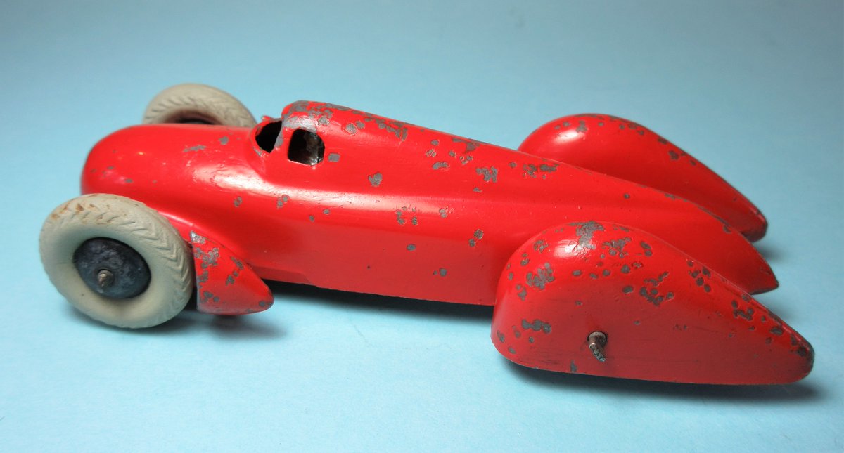 DinkyToysUK's tweet photo. An early post war issue of the #DinkyToys #Auto_Union (now known as #Audi AG) racing car, which was numbered 23d by the #Meccano factory in #Liverpool. Note driver + white herringbone tyres. More from #DinkyToys, #Corgi,#Matchbox, #Hot_Wheels, #Solido etc. in due course https://t.co/VkRvMKgNiO
