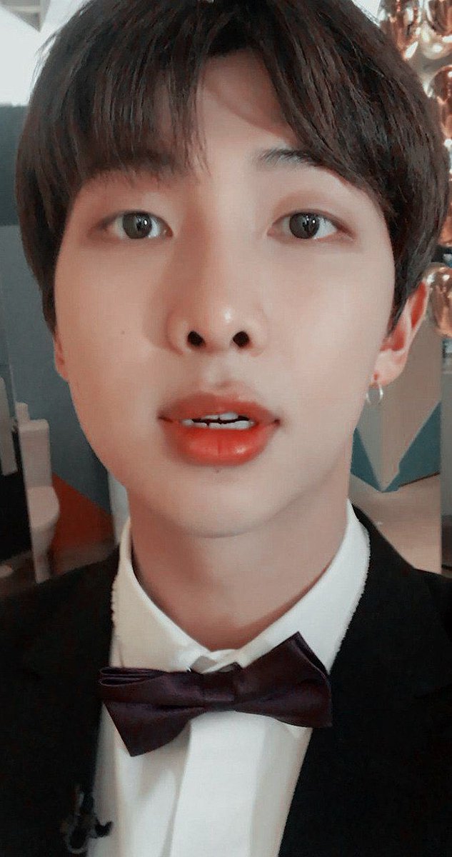 in a suit thirst trap joon