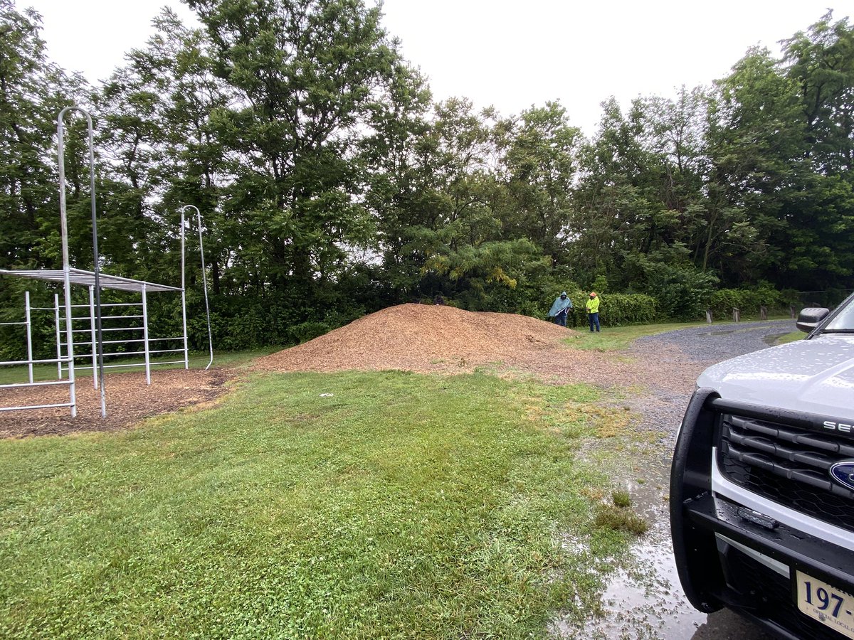 over by the playground, men who say they’re with the augusta county militia are hiding behind a mulch pile