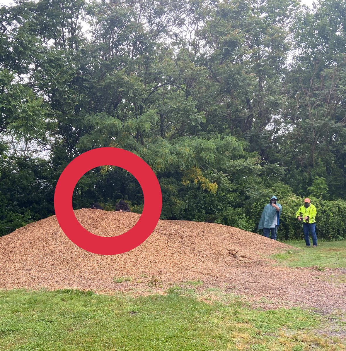 over by the playground, men who say they’re with the augusta county militia are hiding behind a mulch pile