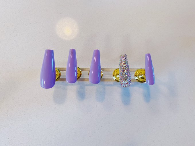 Selling my first pair of press on nails I made on my depop. They are size Medium and they are called