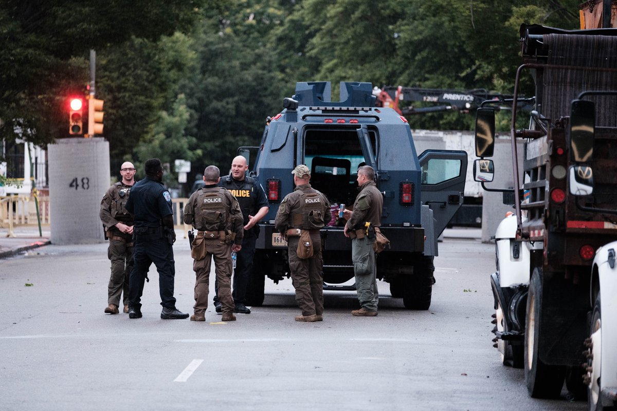 Cops in America adopting siege posture. Police station in Richmond has concrete and hesco barriers like FOBs in Afghanistan and two stations in Minneapolis have, well, whatever this is...