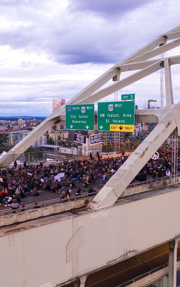 portlandrone's tweet photo. Photos of #Portland Protesters marching over the Fremont Bridge In Portland, Oregon on 06-16-2020 https://t.co/AIMnjnHhuN