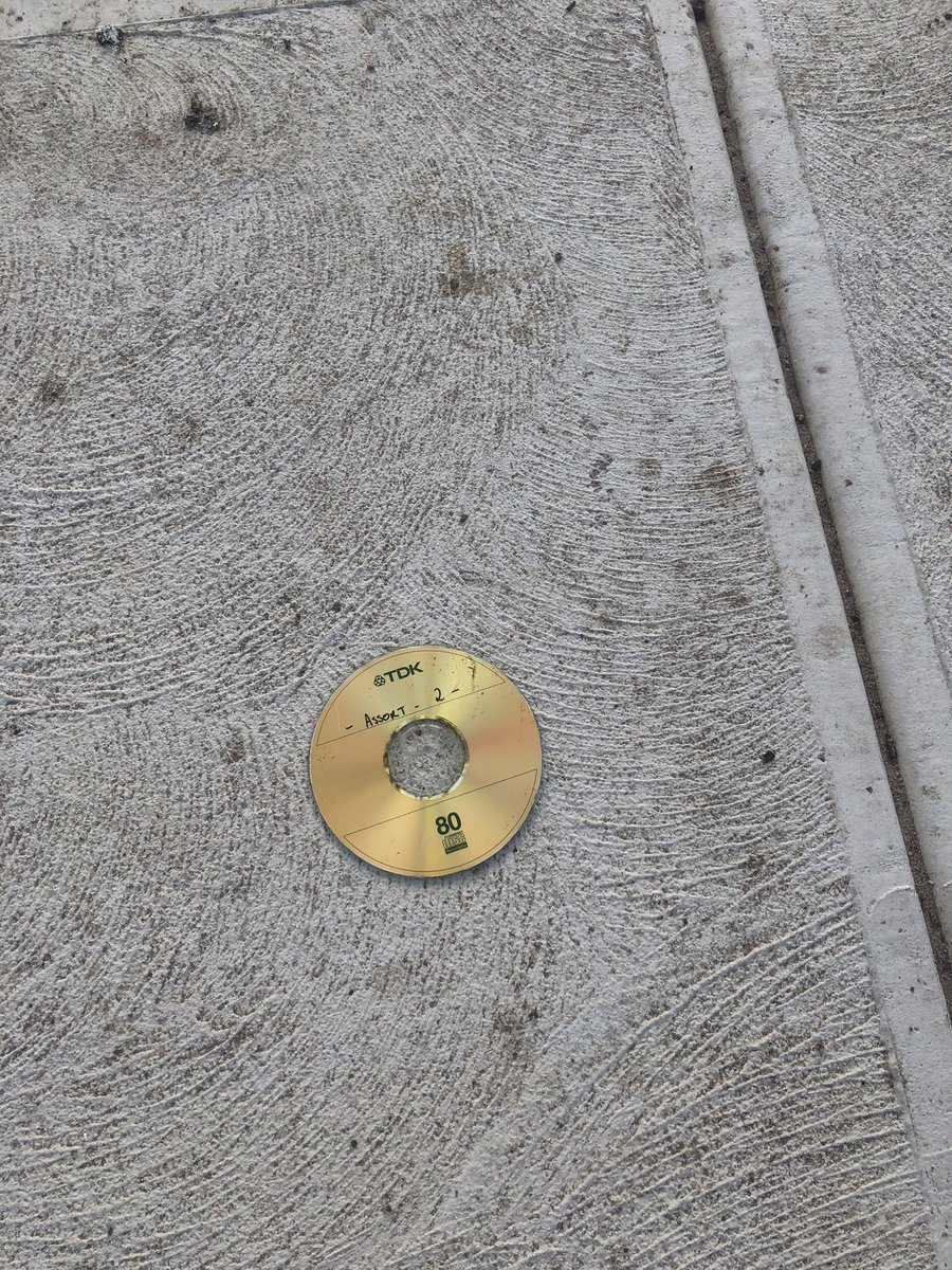 Found this on the side of the road and for some reason I really want to know that is on it! Takes me back to the days of having a CD folder collection of MP3s that was always on the passenger side footwell of my 1988 Mitsubishi.