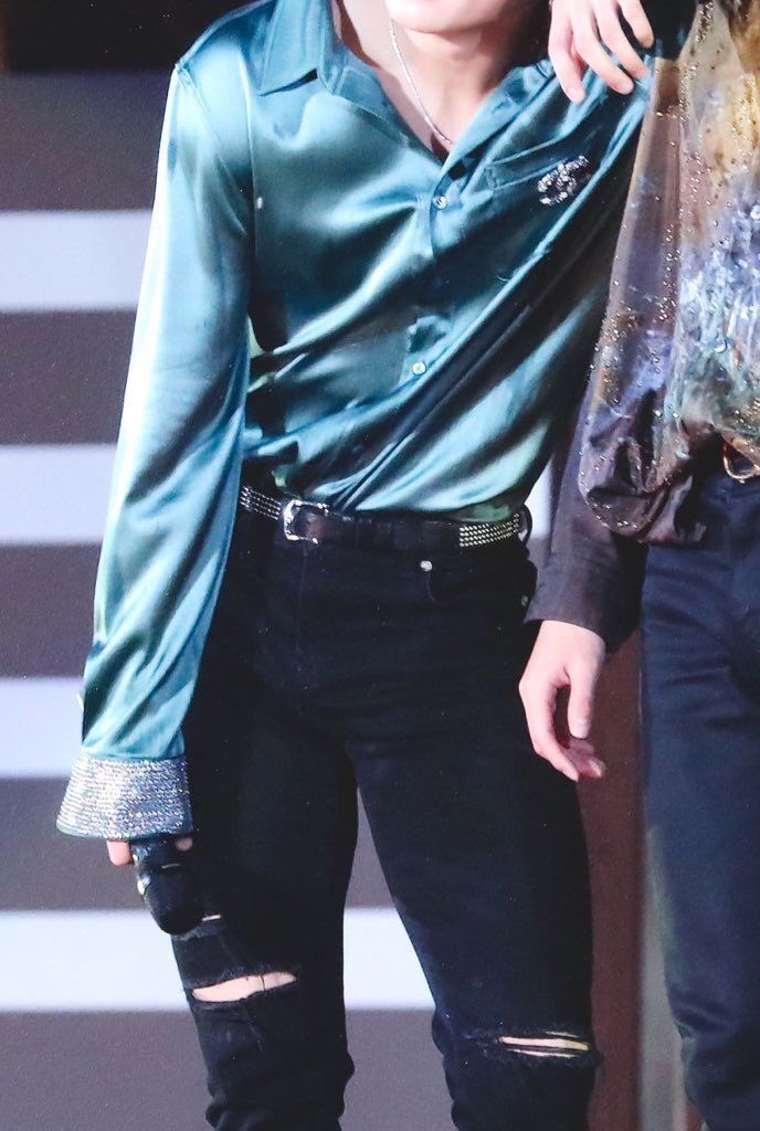 jungkook with his shirt tuck in; a thread