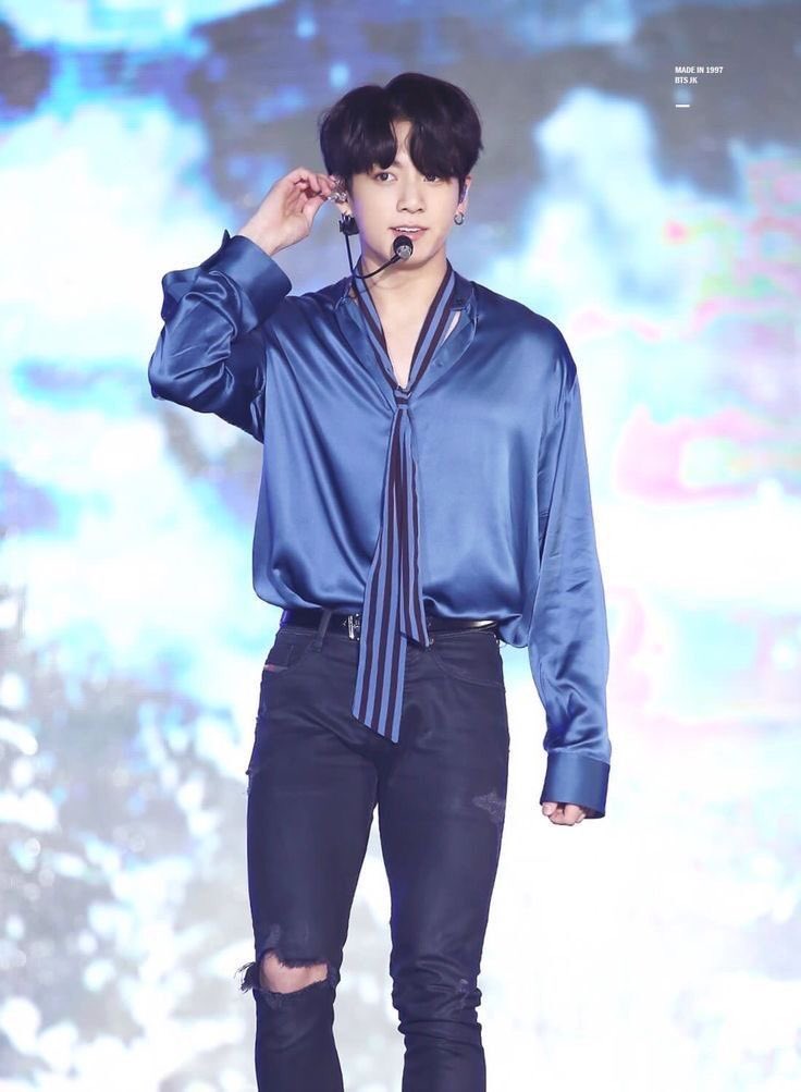 jungkook with his shirt tuck in; a thread