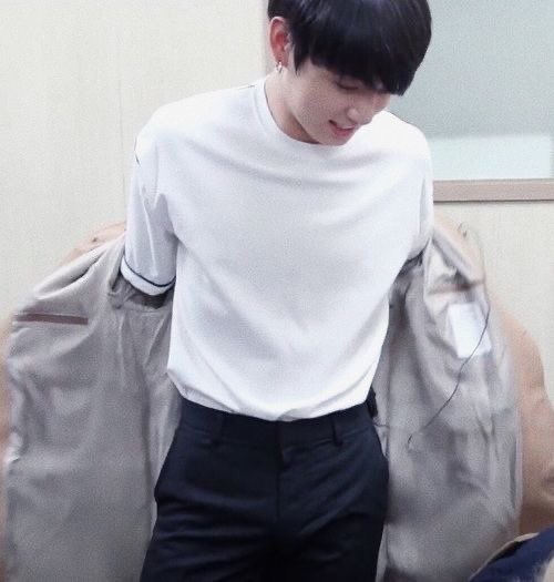 jungkook with his shirt tuck in; a thread