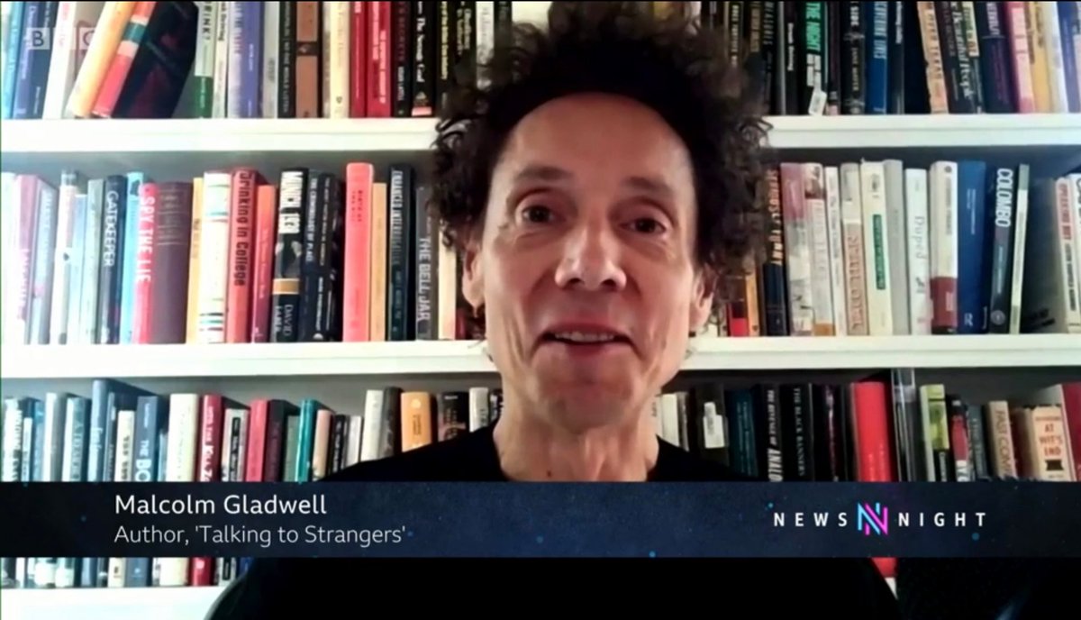 BCredibility's tweet photo. Malcolm Gladwell plays safe with bookcase wallpaper but some astute moments reveal his craft. Malcolm's hair fills the often overlooked vertical plane. This builds intimacy, as does the tight focus. Small gaps are left to suggest books are in use. It's classy, active credibility. https://t.co/HVENaVe6Tf