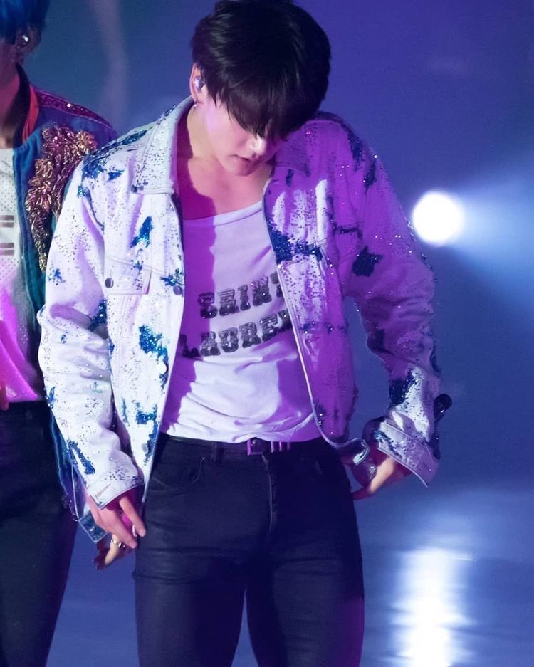 jungkook with his shirt tuck in; a thread