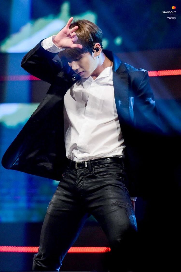 jungkook with his shirt tuck in; a thread