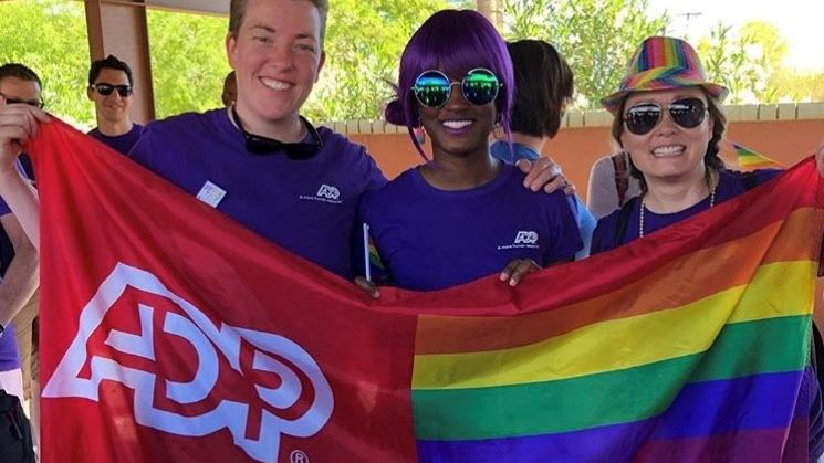 ADPCareers's tweet photo. #TBT to Tempe associates participating in the 2019 Phoenix Pride parade. Although we won’t be able to gather together, we can still celebrate in the comfort of your own home. How will you be showing your pride In place? 🌈 🏡 #Pride2020 #ADPPride #ADPLife #EachPersonCounts https://t.co/YMdHsAluF2