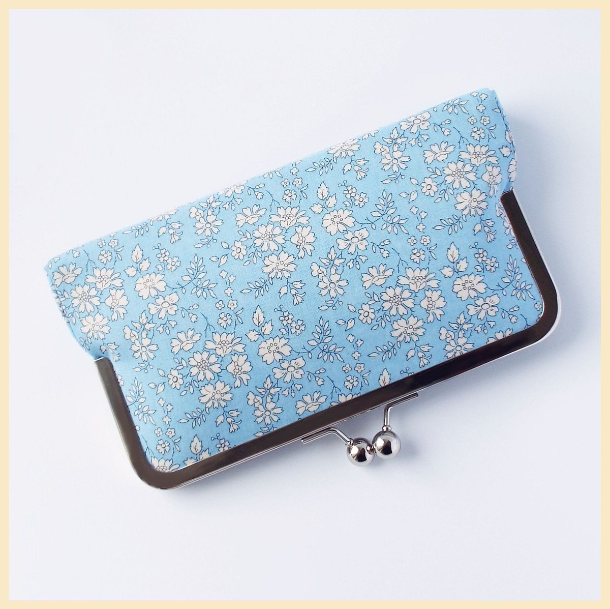 pale blue clutch for an outdoor wedding: etsy.me/3fyzrgD #floralclutch #wedding #gardenwedding #summerwedding #libertyprint #weddingclutch #flora #giftforher #floralgift #weddingplanning #weddingideas #floraldesign