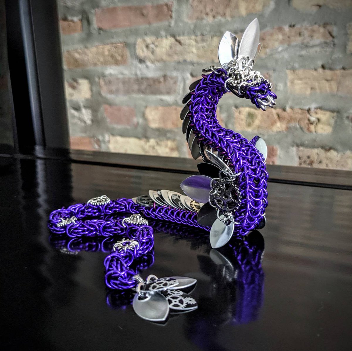 tabithaolson's tweet photo. Steampunk Chainmail Dragon, purple https://t.co/keviwoUvVn 
#steampunk #chainmaildragon #chainmaille #dragon #chainmail #etsy #weavinglinks https://t.co/GgoasyMgSb