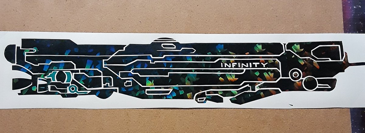 HotDogHowitzer's tweet photo. The uvinerse blessed me w the EXACT black holo vinyl I've been wanting for a YEAR so I could make an Infinity decal. My tendinitis acted up from all the cutting, but she's gonna look GREAT on my rear window. #Halo #UNSCInfinity #HaloInfinite https://t.co/tx6axAwMqQ