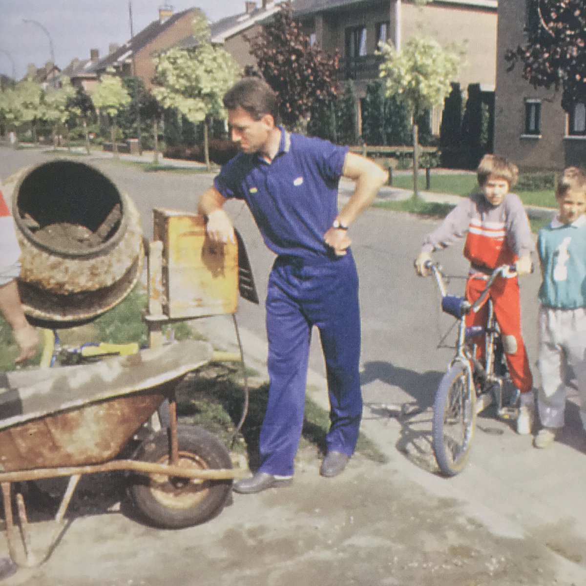 How about a picture of Sean Kelly, a cement mixer and a cool kid on a BMX?