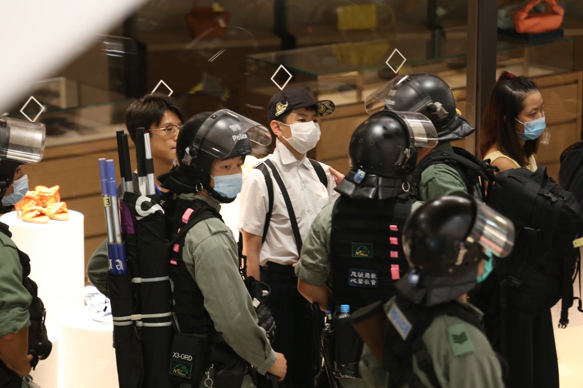 Among eight ( six male and two female) detained in Times Square is a young teen.