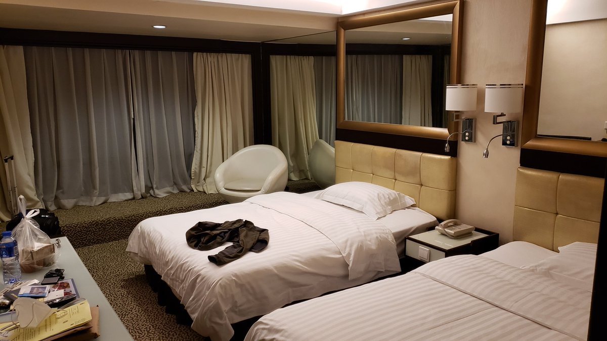 At the hotel, we had to turn in some forms & we were given our room key. The room key only worked once so if you left & try to go back in it would not work. We were given a dinner and tea and a juice box and was directed to the elevator to go to our room. A photo of my free room.