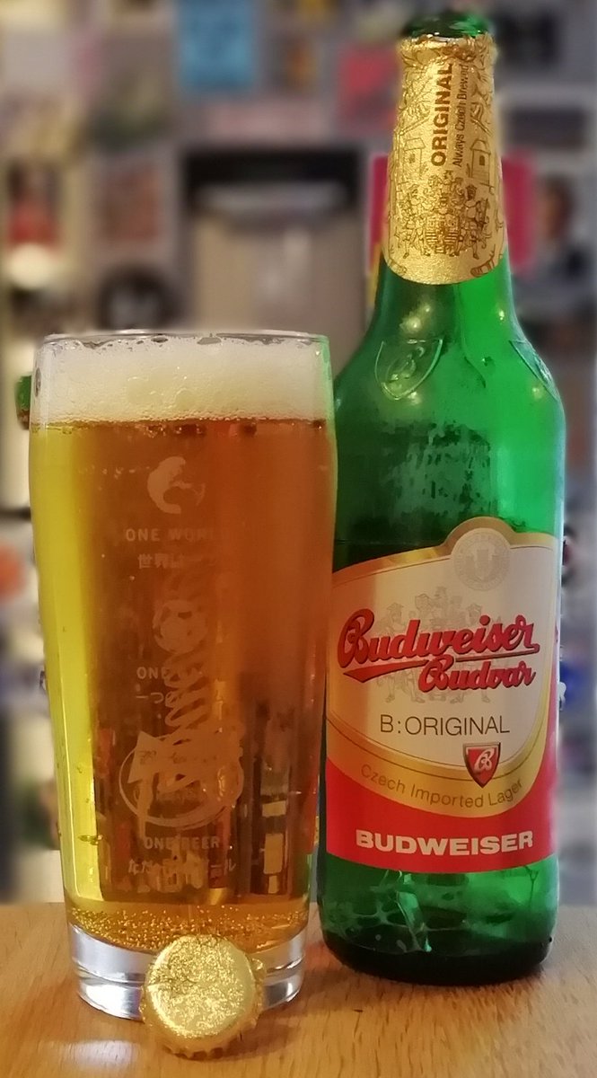 Good bitterness initially but it turns sweeter on warming. The promised head didn't last long at all; no lacing. Picked up this glass at an '02 World Cup party sponsored by the other Bud. By the time the next World Cup came around I was living in Korea where weak lager dominated.