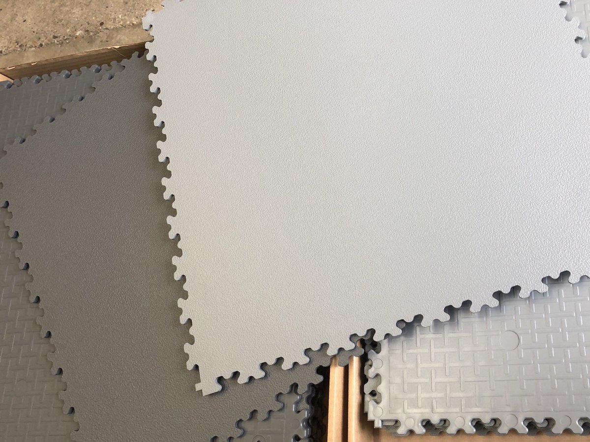 TektilesEurope's tweet photo. A combo of light and dark grey interlocking Tektiles going out today. #paftektiles #tektiles #garageflooring #garagefloortiles #madeinUK #workshopflooring #flooring #floortiles #interlockingflooring https://t.co/5JWcZt3zyc