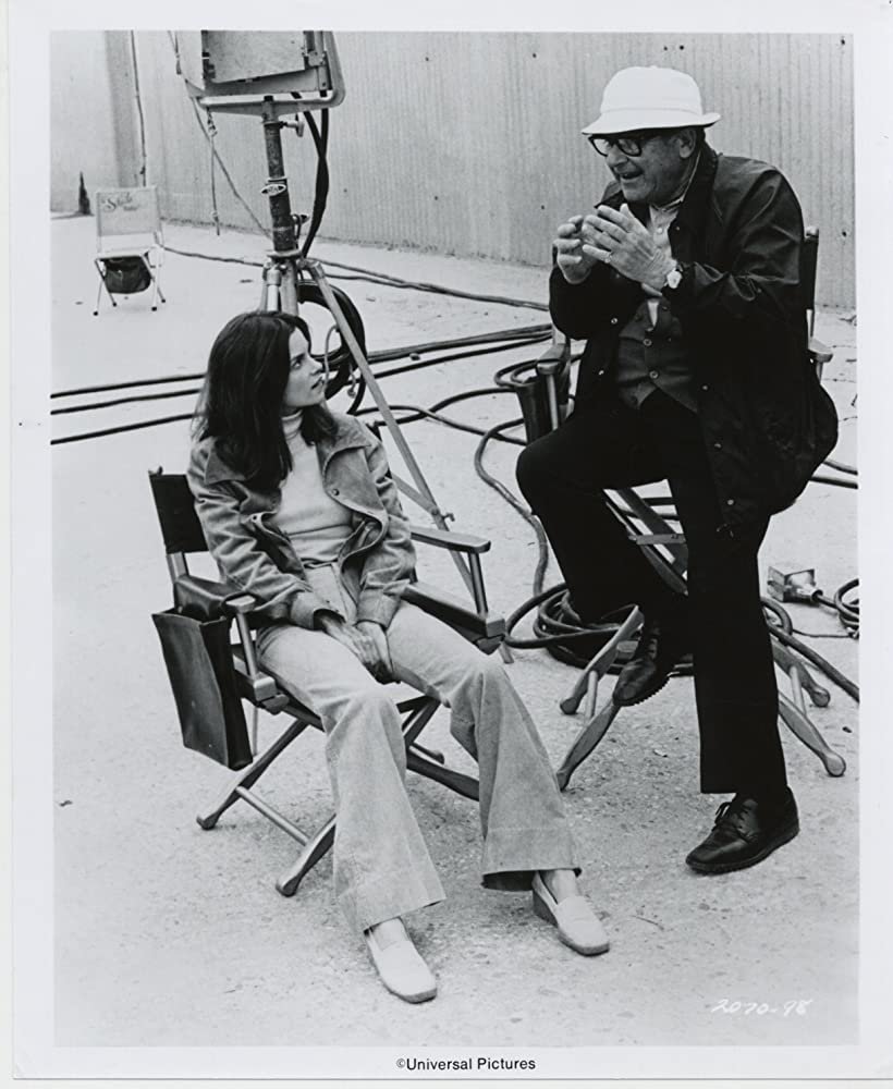 Happy birthday to Genevieve Bujold.  Here she is on the set of \"Earthquake\" from 1974. 