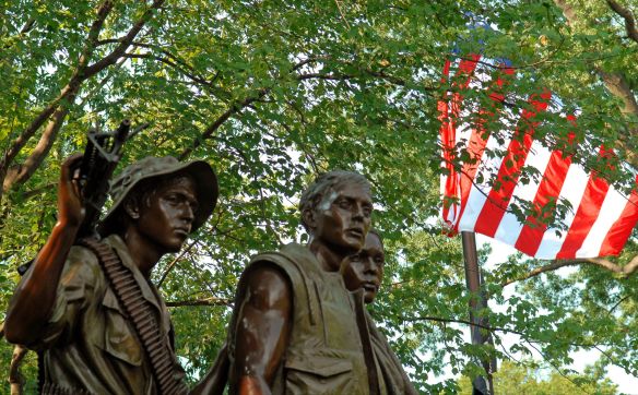 Hart was confronted with how to work with the simplicity of The Wall. His solution was to keep the figures of smaller scale – as to not interfere with The Wall’s much larger scale. He also wanted the statue to withdraw from The Wall so the men would not infringe upon it.