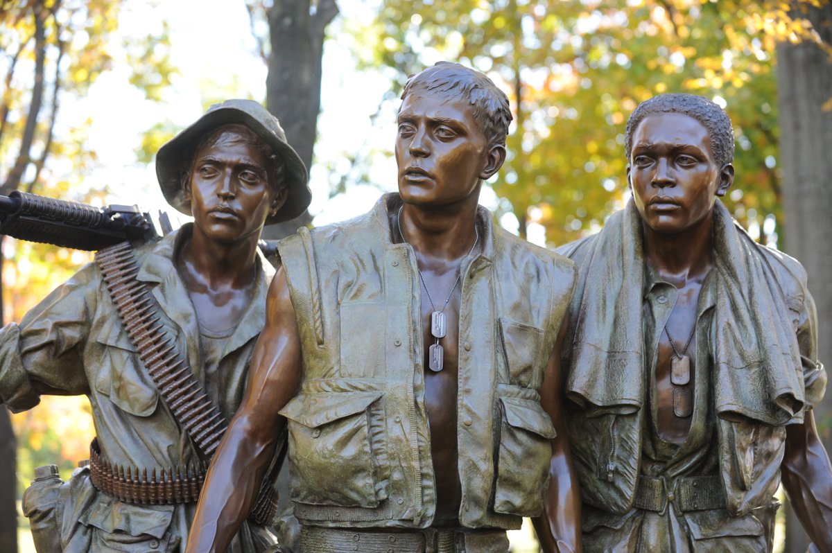 The African-American figure was modeled after U.S. Marine Corps Cpl. Terrance Green, Rodney Sherrill, and Scotty Dillingham. The Caucasian figure was modeled after U.S. Marine Corps Cpl. James Connell III. The Hispanic figure was modeled after Guillermo Jose Smith-Perez de Leon.