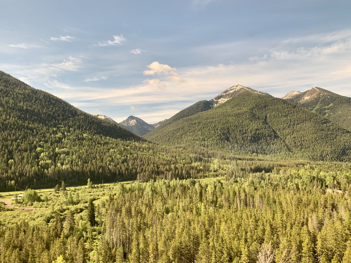 21/ Monday, June 22. We made the Empire Builder with 4 whole minutes to spare (it was on time, and I expected a delay). The first 90 minutes was an absurdly scenic trip through mountain valleys, followed by about another 30-40 minutes of distant snow-topped mountains.
