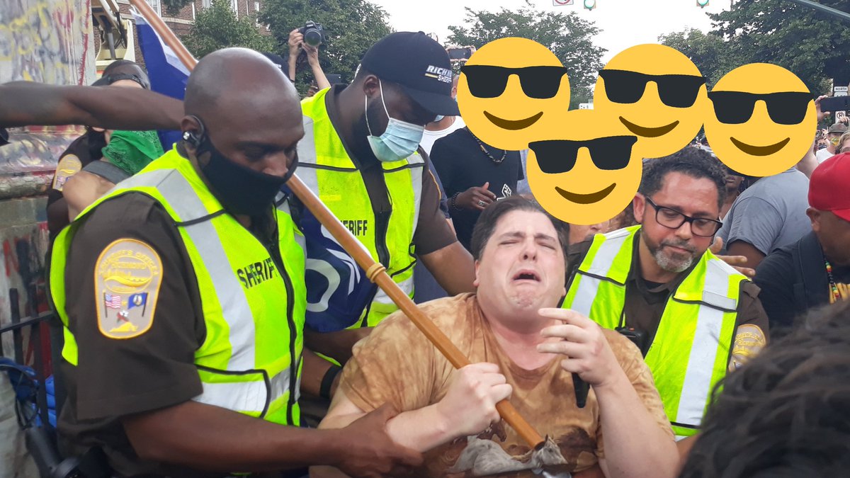 A man with a Trump flag arrived. Sherriff's Deputies removed him while he was crying. Faces of protesters redacted.