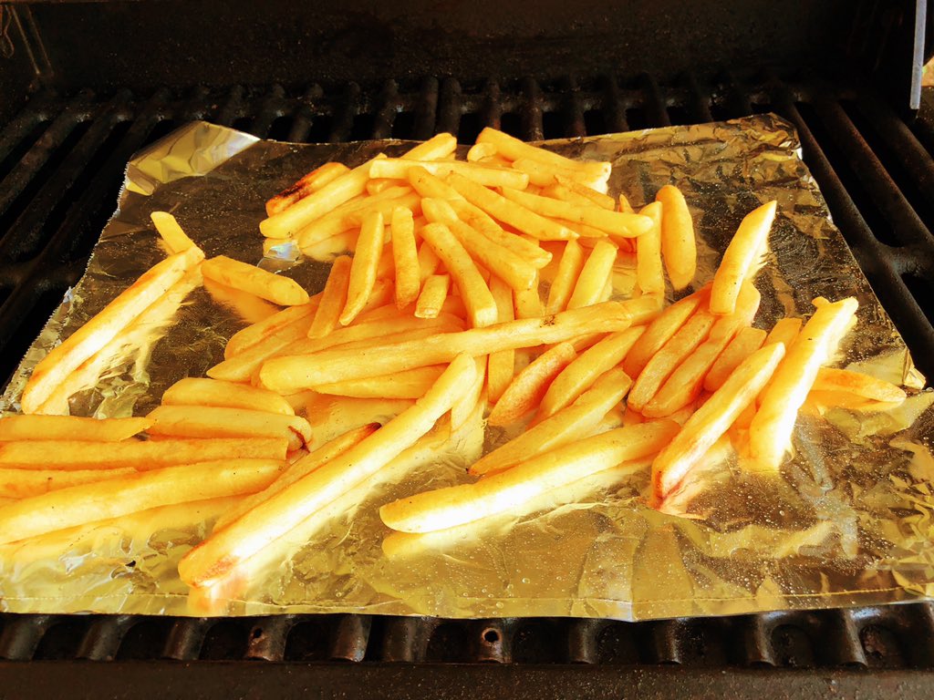 Attempting poutine on the BBQ at the cabin. Happy  🇨🇦  Day !