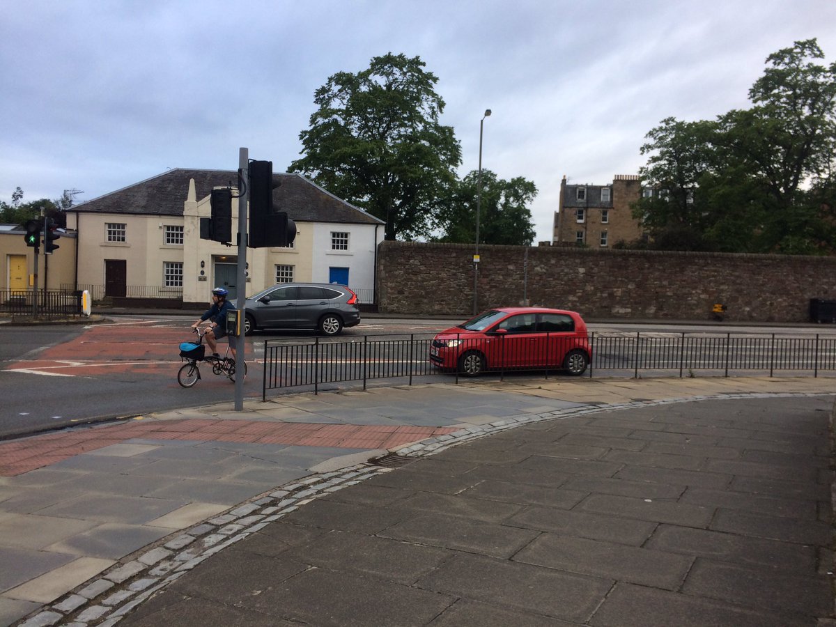 First dangerous incident of night - close-passed, shouted at and beeped at by two drivers - had to ride onto pavement as third driver revving and beeping on my tail. Should have taken the roundabout route through housing estate. This corner/road is a death trap for cyclists.
