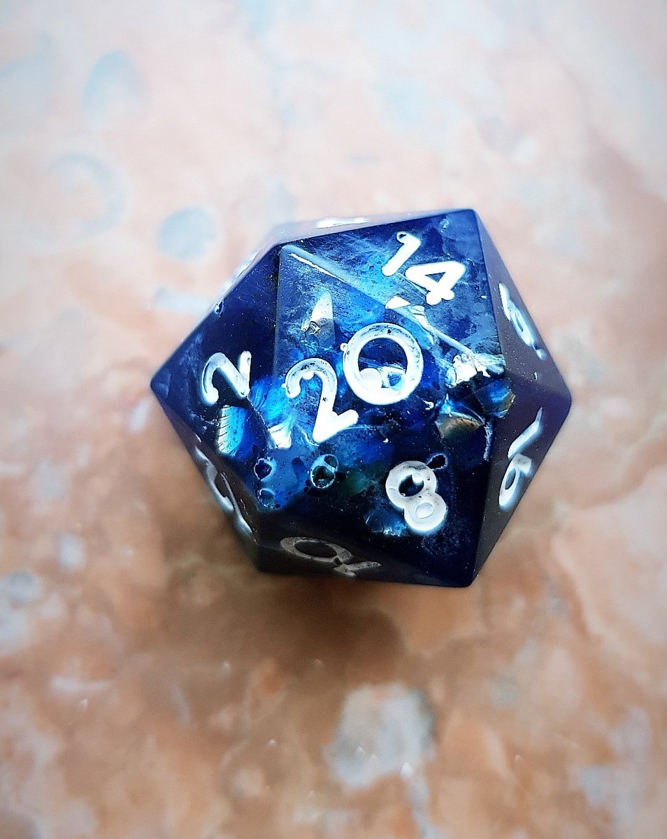 - blue and red. I've got yellow and white flowers in my garden so I can use these, too. I also have white holographic pigments to create kinda rainbows inside my dice. And I can do double colored dice but those are still a work in progress.Here are some examples of my work.3/?