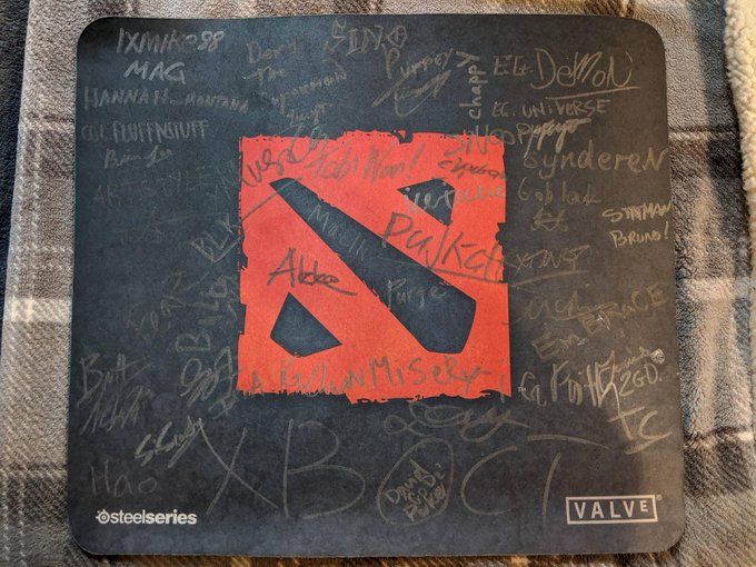 Dota2Lounge's tweet photo. TI2 mousepad is a true relic, brings up a lot of memories. How many future champions signed it? 🙄
#TI2012 #dota2 #theinternational https://t.co/eU9pb58DKT