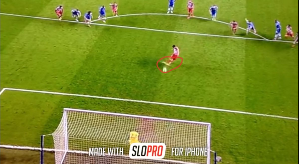 The S in the above images was were he was standing against Stegen. To give a more clear perspective see this. In the 1&2 image, his left leg leans on the extreme right to give his body the balance to shoot the n extreme left. 3rd image shows his left leg is placed central to ball