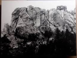 It took 19 years for the Court of Claims to render a decision. In 1942, the Court dismissed the claim.In the meantime, the United States carved the faces of four presidents into a granite mountain in Paha Sapa.Here’s what “Mt. Rushmore” looked like before the desecration.