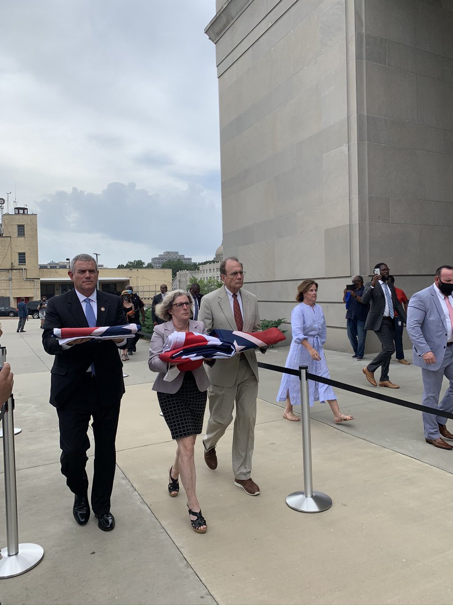 MSHumanities's tweet photo. Katie Blount of @MDAH_Official with @PhilipGunnMS and @DelbertHosemann delivering the final flags flown over the Capitol to the Museum of Mississippi History. https://t.co/zK3OgcG4G5