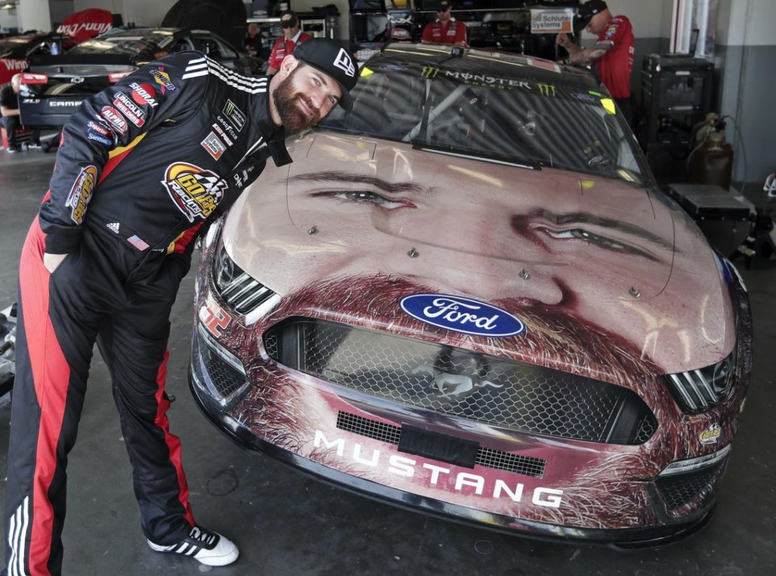  @OldSpice sponsored him last year and got him to put his face on the hood...topped it this year by running a similar scheme, but with a mask on. Mask cheerleaders should love this guy. How can you cancel a driver with a mask on his face on the hood of his car?