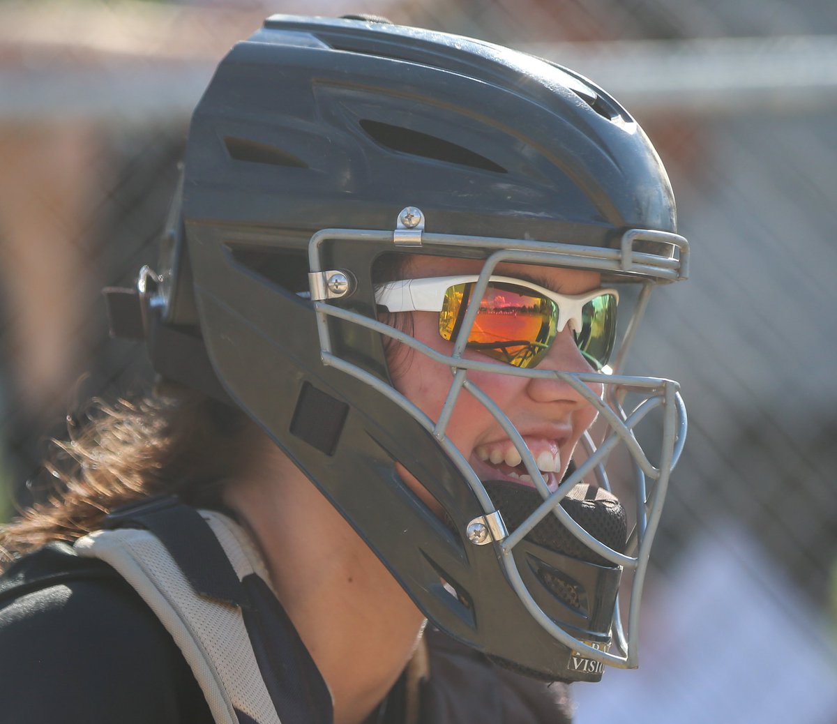 MikeDarnay's tweet photo. Jaguars Fast Pitch C Mackenzie Zang smiles while setting up behind the plate before a pitch against Rams Fast Pitch on Jul. 1st, 2020 in the Mon Valley Independent Senior Swing Softball Tournament. https://t.co/zAO6Siuu38