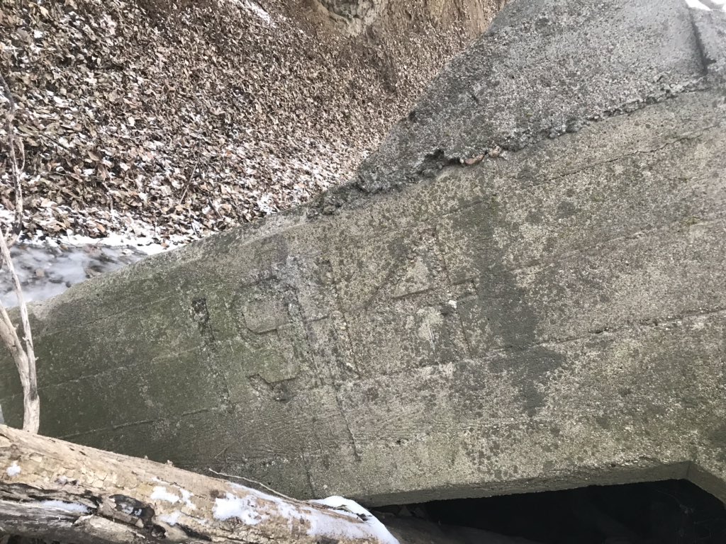 Follow the embankment where the steel rails used to run. Climb down into the 40-foot canyon. Find the marking on the washed-out culvert.“1914”This is your first clue of what happened on this land, an epic failure that paved the way for incredible opportunity. 1/