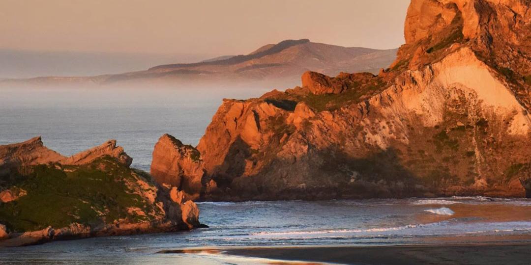 PureNewZealand's tweet photo. Can you guess #WhereInNZ we are? Hint: This place is home to a well-known lighthouse along a rugged coastline. 🌊 📷: IG the.happiers https://t.co/bVnJD8FmVK