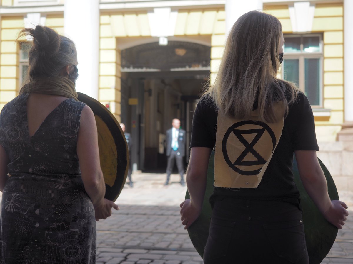 Finnish ministers cars blocked by Rebels - Activists used their bodies to physically block the ministers' cars from entering Senate building, demanding that politicians recognize that the economy can no longer be run as it was before the COVID-19 crisis. #BailOutThePlanet