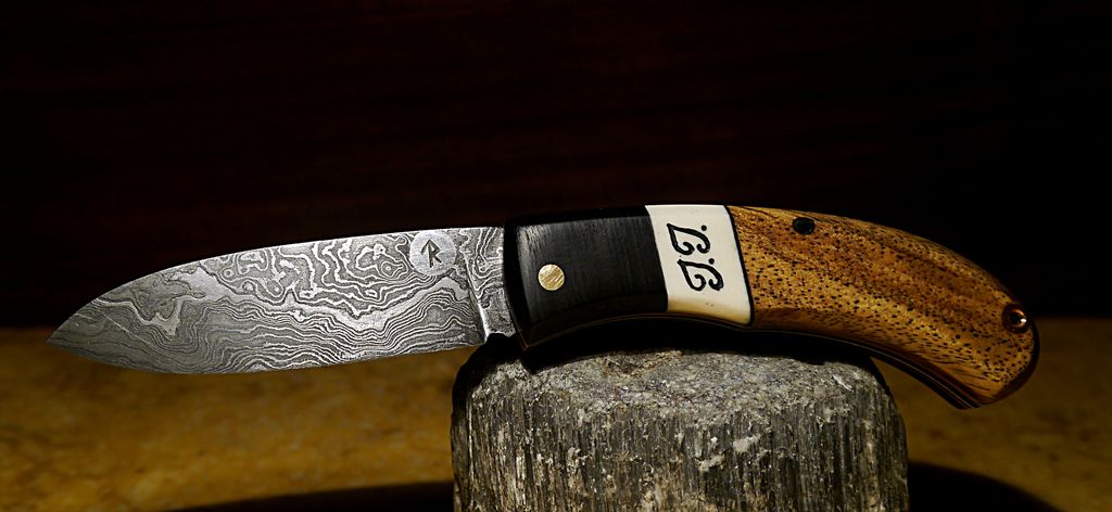 RodsAndBlades's tweet photo. As promised... hand forged Damascus blade, gunstock grade Turkish walnut, 5000years old bog oak wit the radiocarbon dating certificate, a piece of mammoth tusk with owner's initials...do you think J.J. will be pleased? 🤔 #customknives #edc #customrod #eatingtools #campingworld https://t.co/YHKE5927QJ