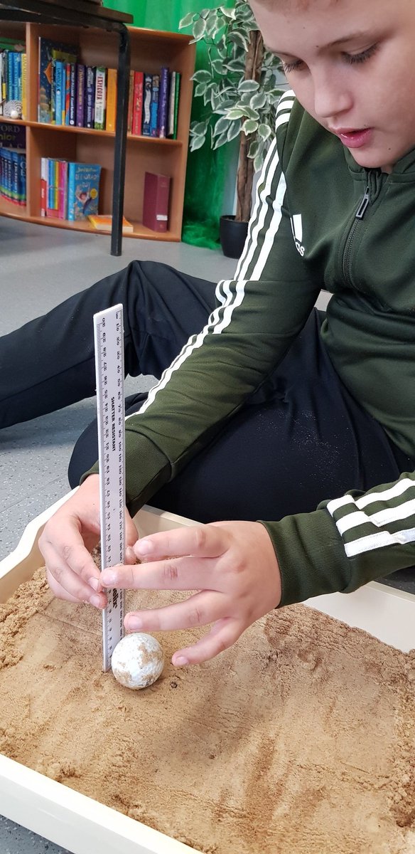 EndeavourClass's tweet image. We enjoyed investing how the height at which a ball is dropped from changes the size of the crater it creates @normanbyspital #dinosaurmeteor #lovescience