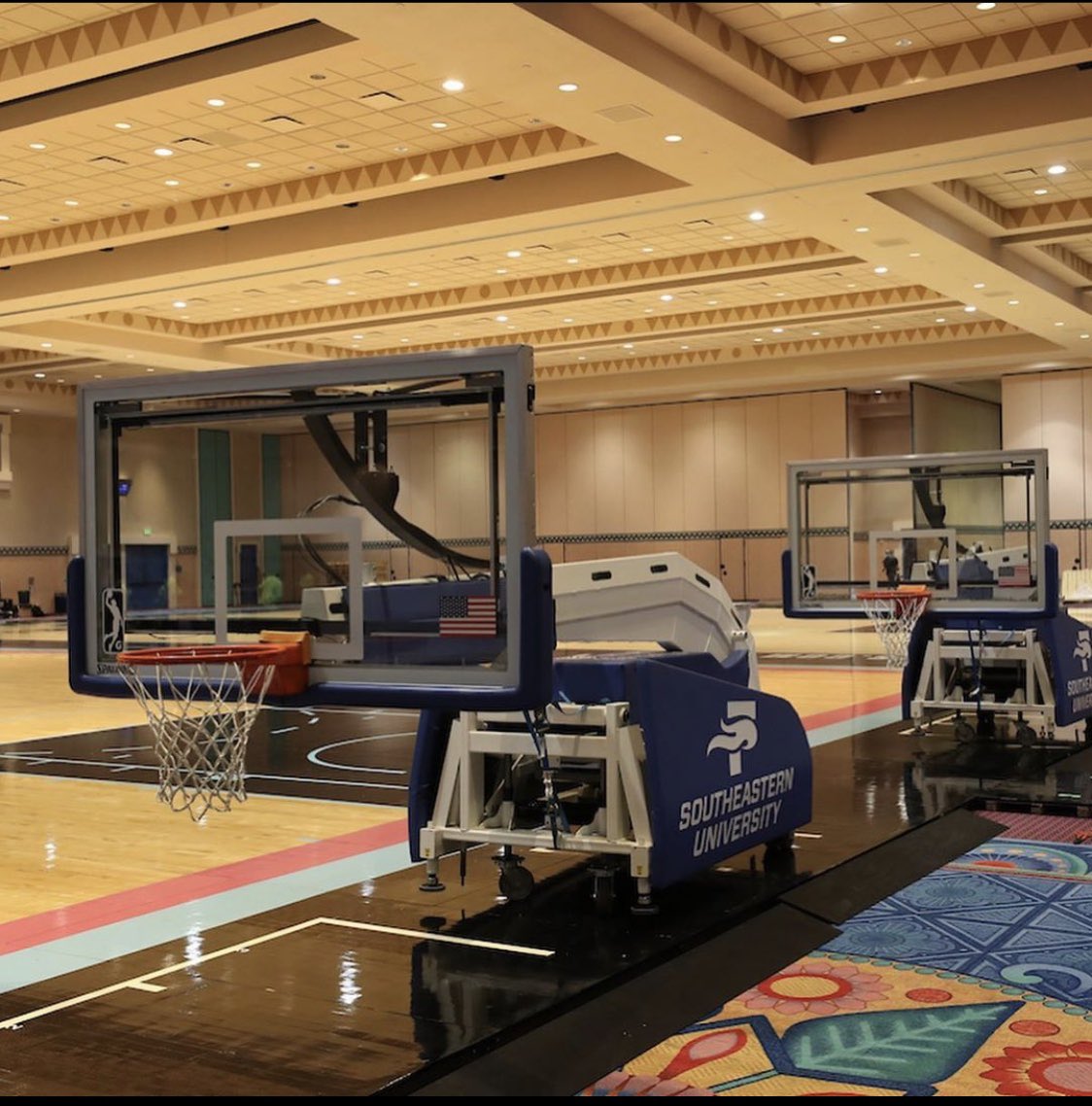 Rachel__Nichols's tweet photo. The NBA had teams send their actual courts to Orlando and is installing them to use as practice spaces.
📸: @NBA https://t.co/xstQZmNWMs