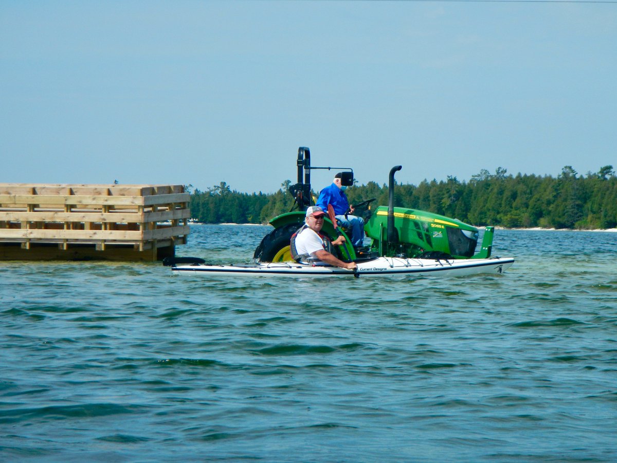 Tractor/kayak race at Cana Island.  #CanaIsland #kayakdoorcounty