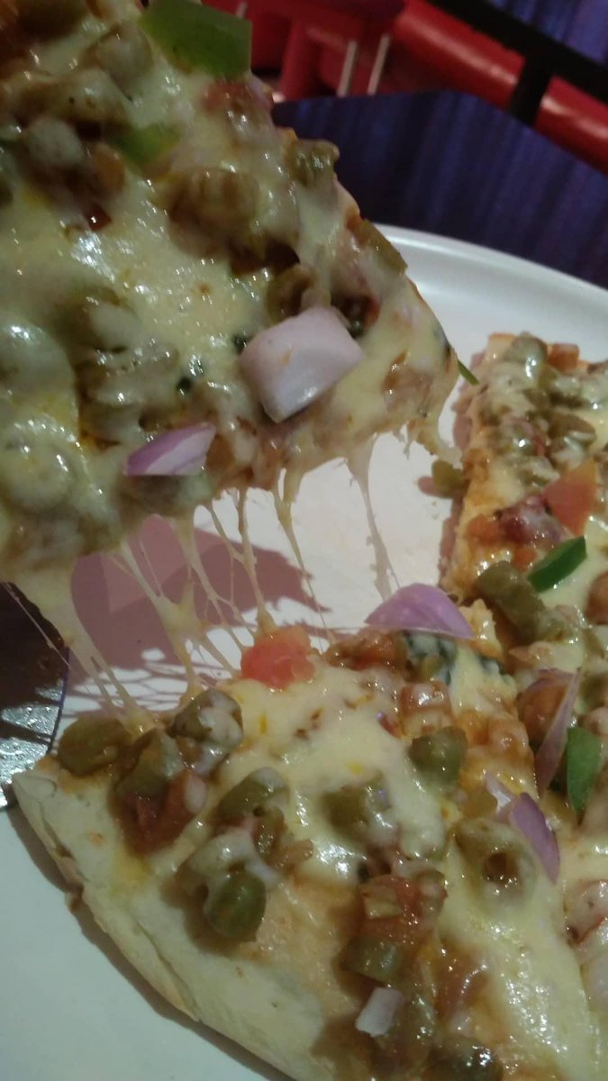 You would have seen pineapple on pizza and even banana. But no place does pizza like Arasan bakery. They top theirs with mutton and peas.Better known for its ice-cream jelly concoctions. Best known for its cubicle seating favoured by the young ones of the city.