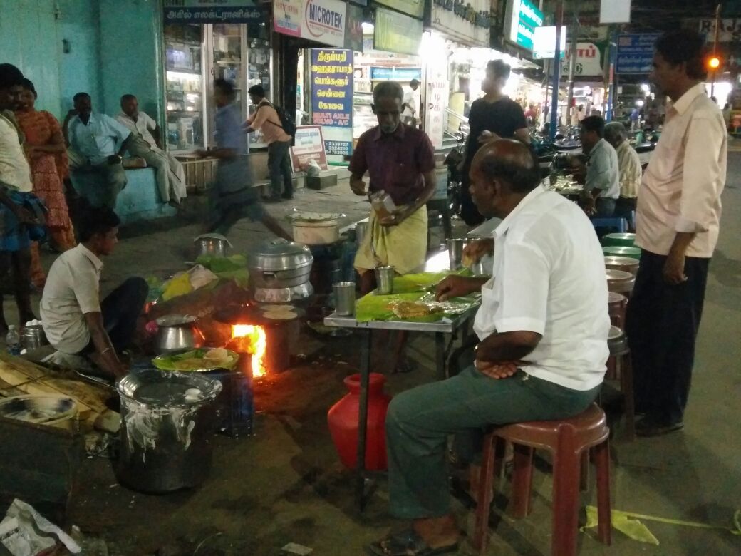 But I have saved the best for the last. Nellai express leaves around 740pm. Once it leaves the road leading to Tirunelveli junction will be deserted.In another five mins, you ll find men setting up tables and idli kundans. And a looooong line of men waiting to eat.