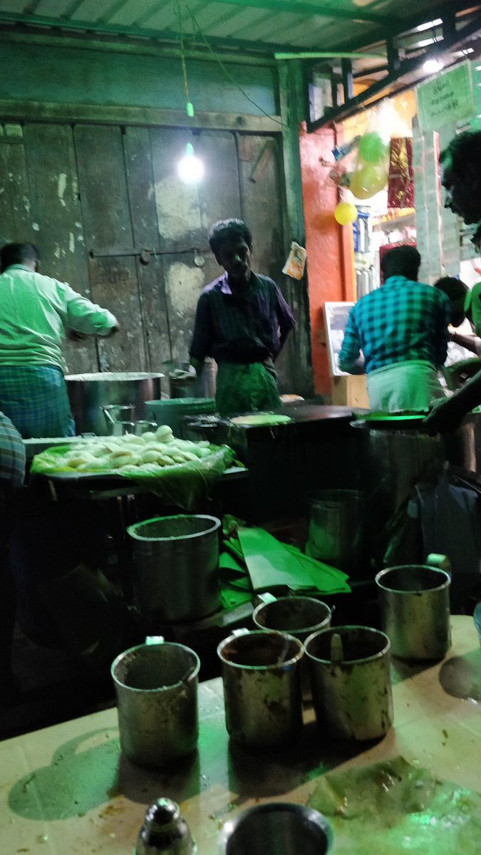 But I have saved the best for the last. Nellai express leaves around 740pm. Once it leaves the road leading to Tirunelveli junction will be deserted.In another five mins, you ll find men setting up tables and idli kundans. And a looooong line of men waiting to eat.